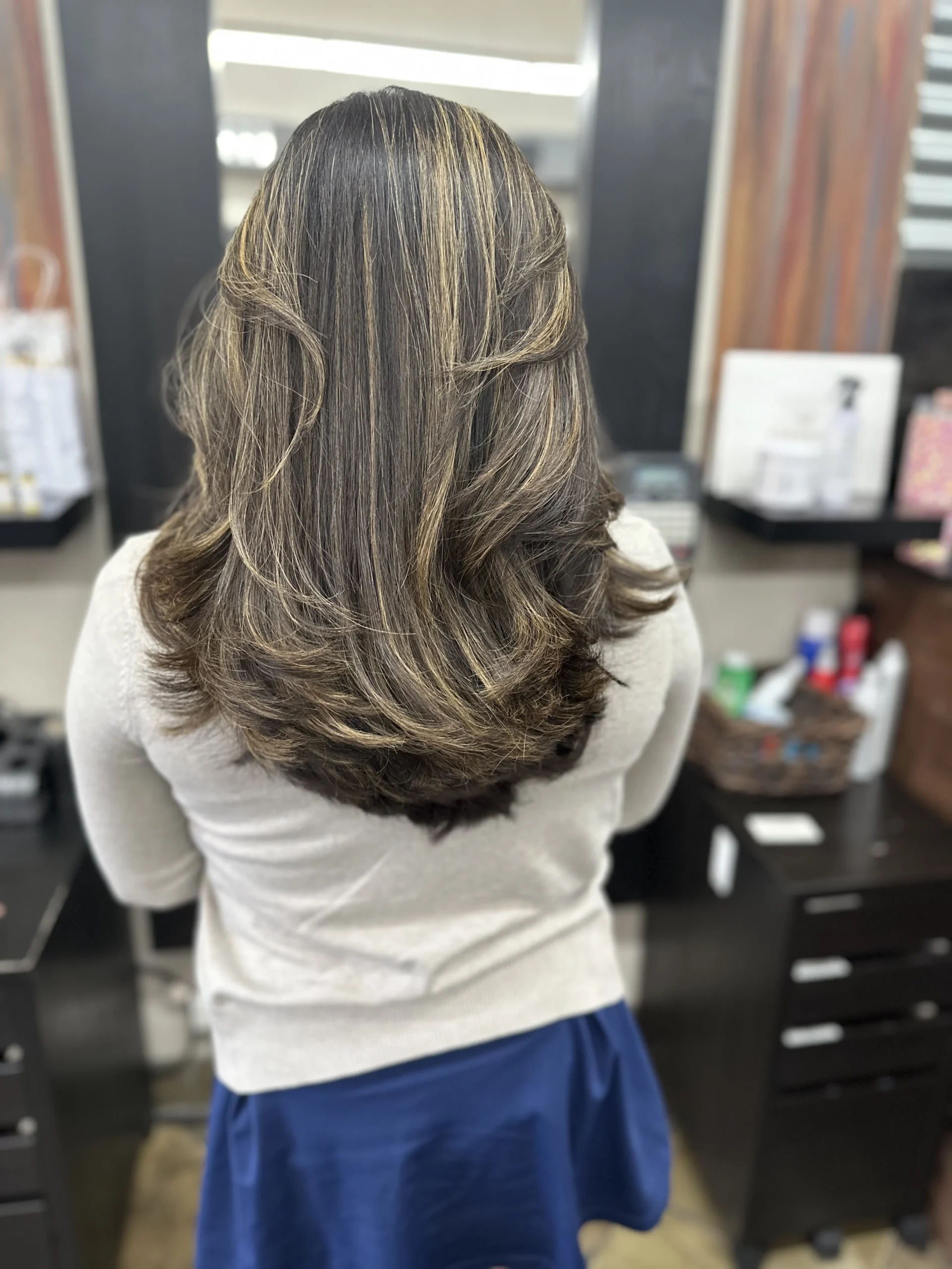 Brunette highlights and layered finish by Olivia Hair Studio