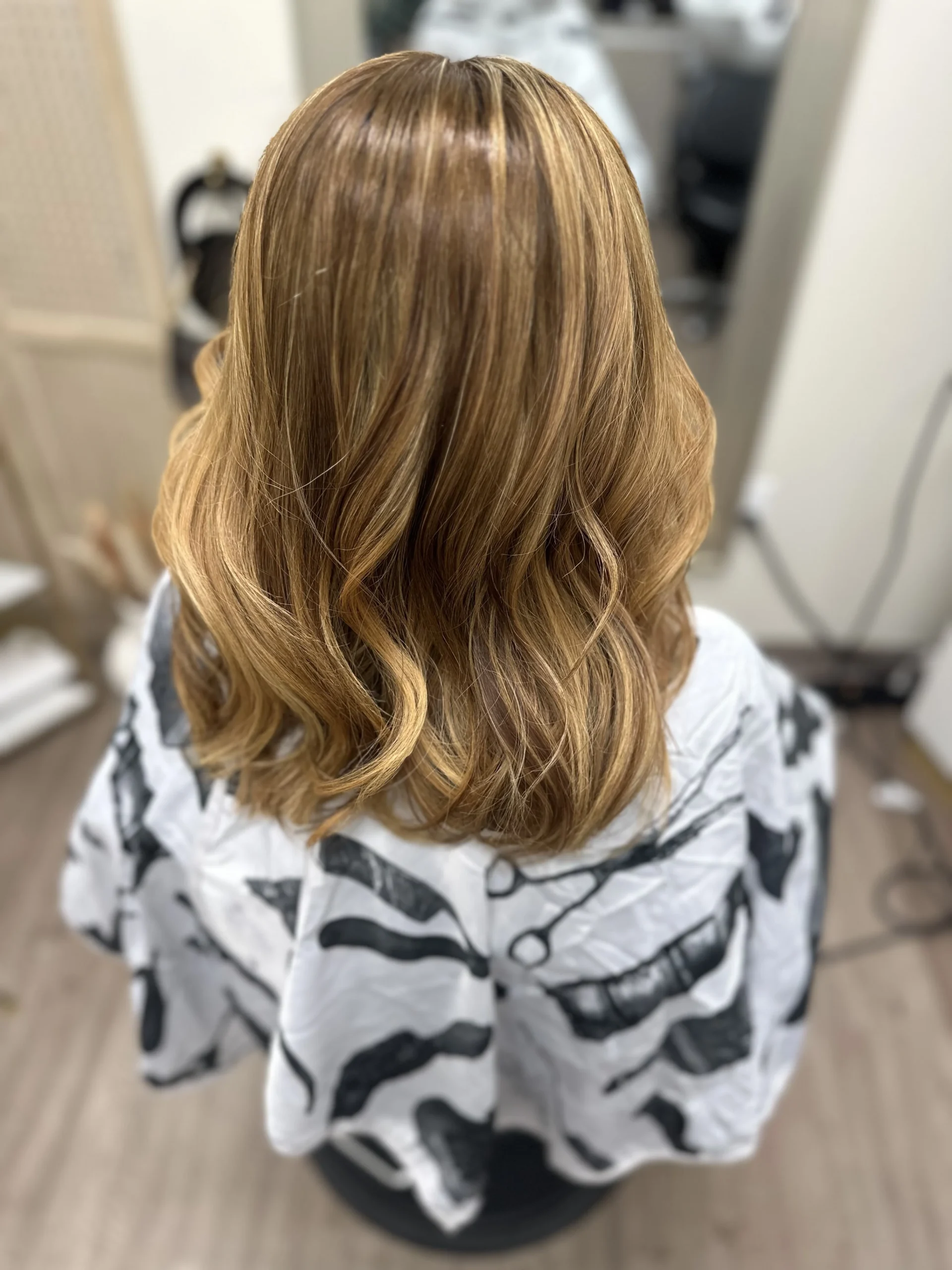 Warm dimensional color by Olivia Hair Studio
